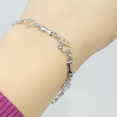 Armband mit Hundepfoten- und Knochenanhängern aus reinem Silber