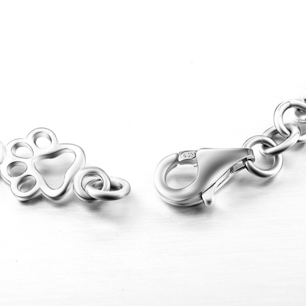 Armband mit Hundepfoten- und Knochenanhängern aus reinem Silber