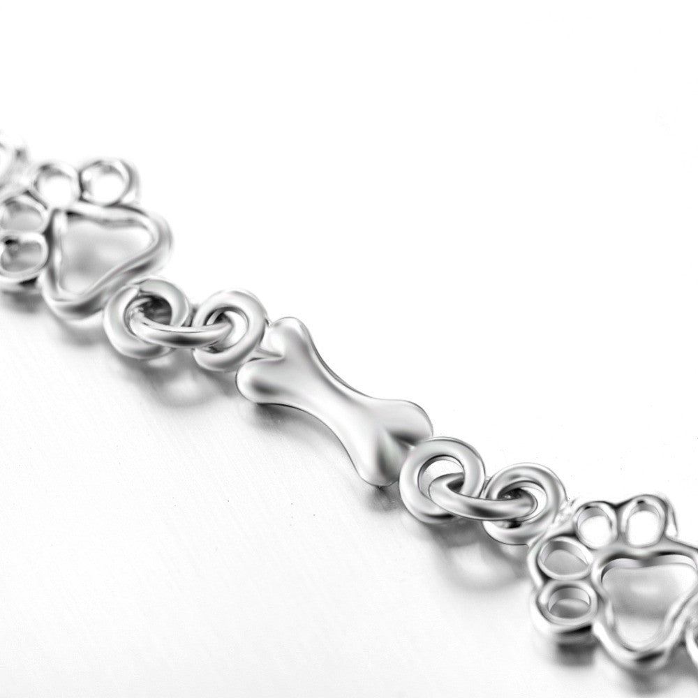 Armband mit Hundepfoten- und Knochenanhängern aus reinem Silber