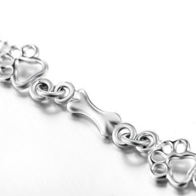 Armband mit Hundepfoten- und Knochenanhängern aus reinem Silber