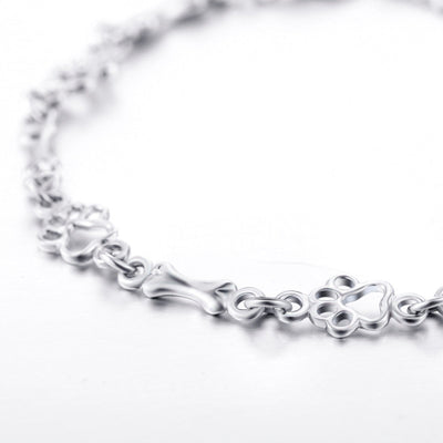 Armband mit Hundepfoten- und Knochenanhängern aus reinem Silber