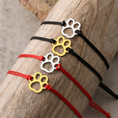 Verstellbares Pfotenarmband mit schwarzer & roter Kordel