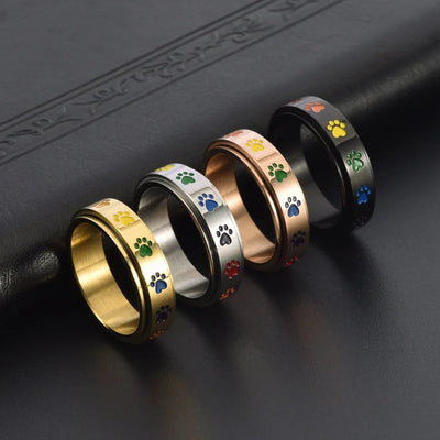 Drehbarer Anti-Stress-Ring mit Pfoten – Edelstahlring mit Regenbogenfarben