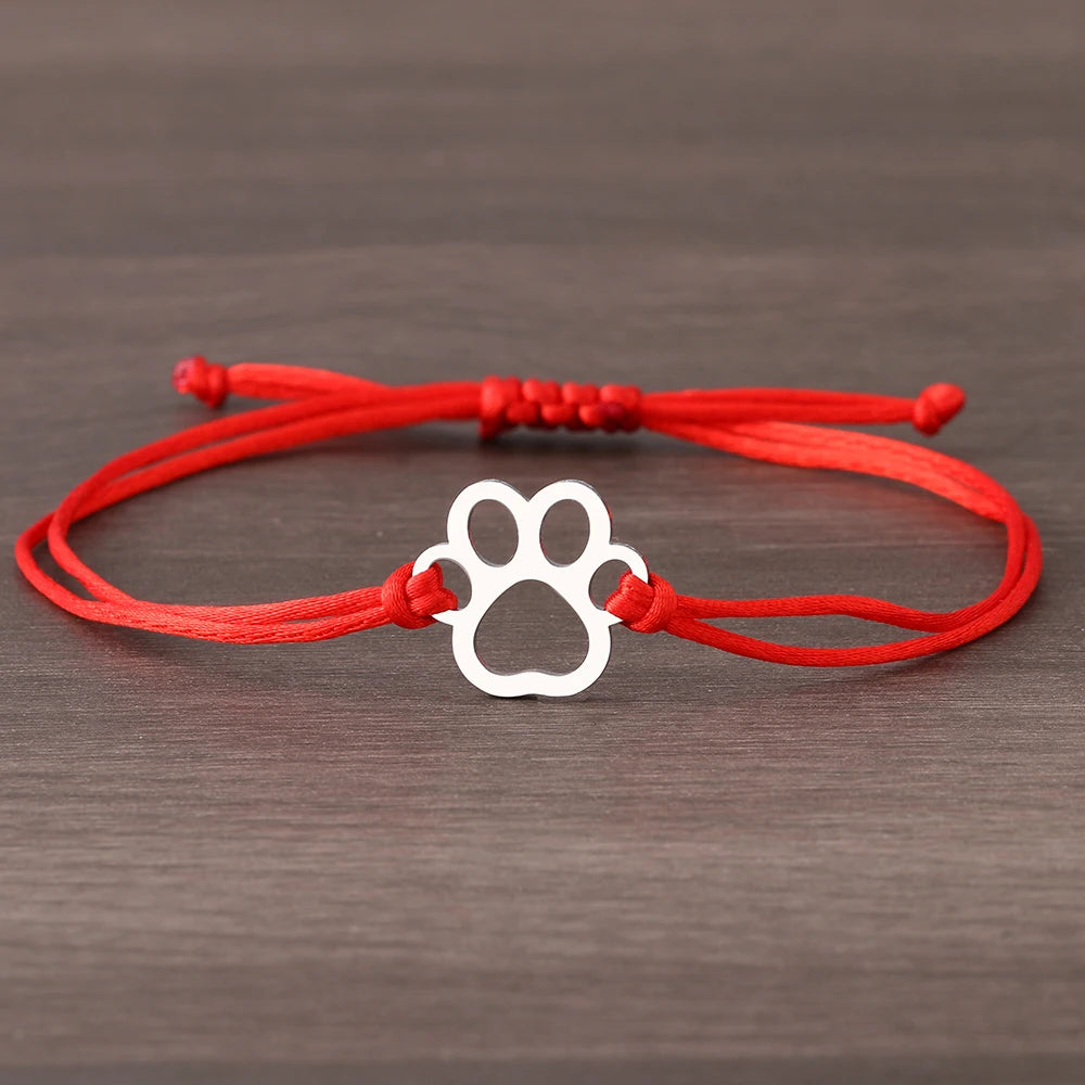 Verstellbares Pfotenarmband mit schwarzer & roter Kordel