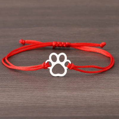 Verstellbares Pfotenarmband mit schwarzer & roter Kordel