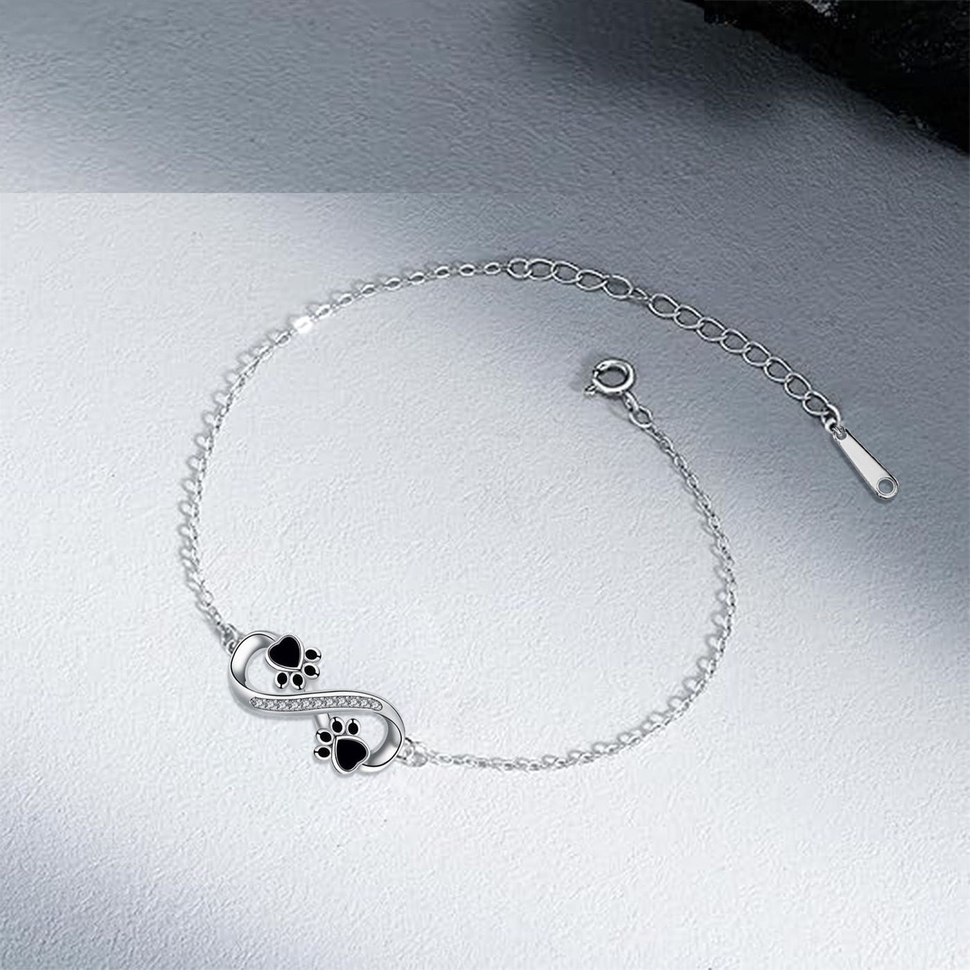 Unendlichkeits-Symbol Armband mit Pfötchen-Anhänger & Zirkonia